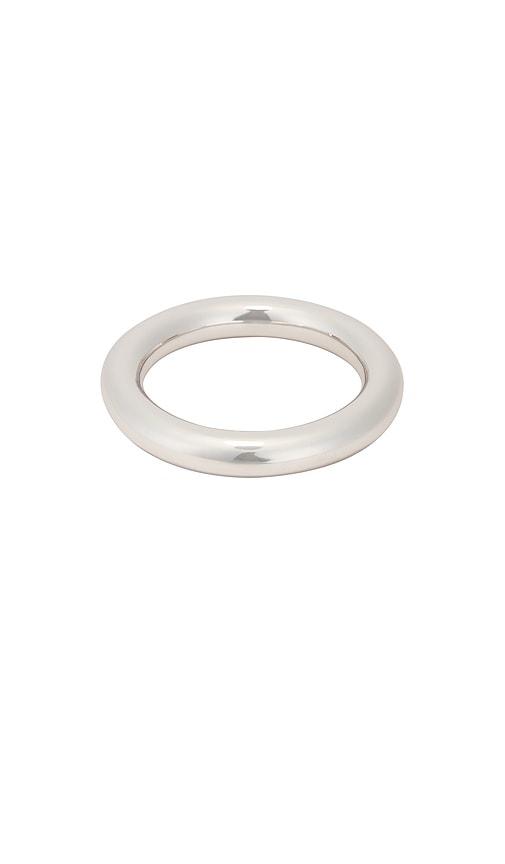 uncommon matters stratus bangle in metallic silver.