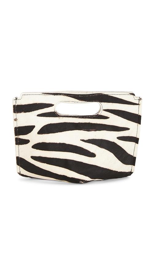 understated leather x revolve liar zebra clutch in black,white.
