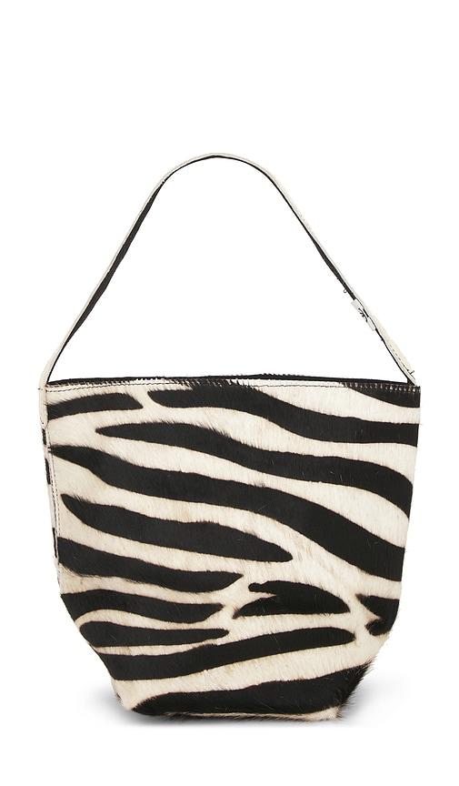 understated leather x revolve small zebra bucket bag in black,white.