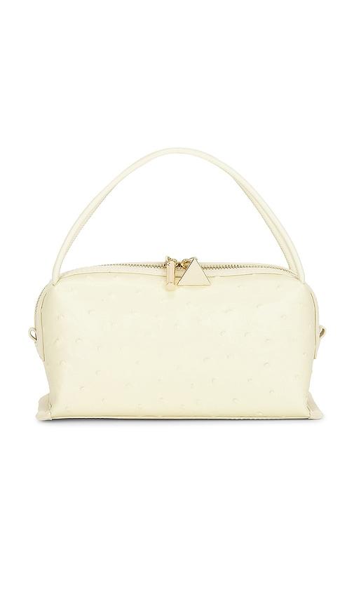 verafied x revolve ostrich cafe mini bag in yellow.