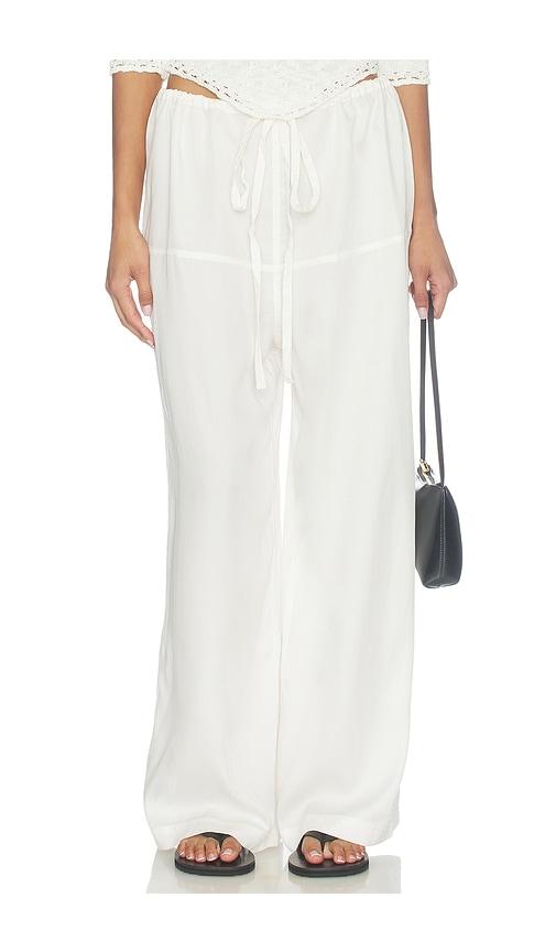 with jean norah pant in white.