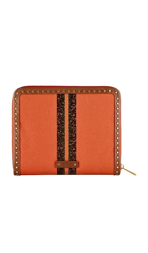 wolf ida travel jewelry portfolio in orange.