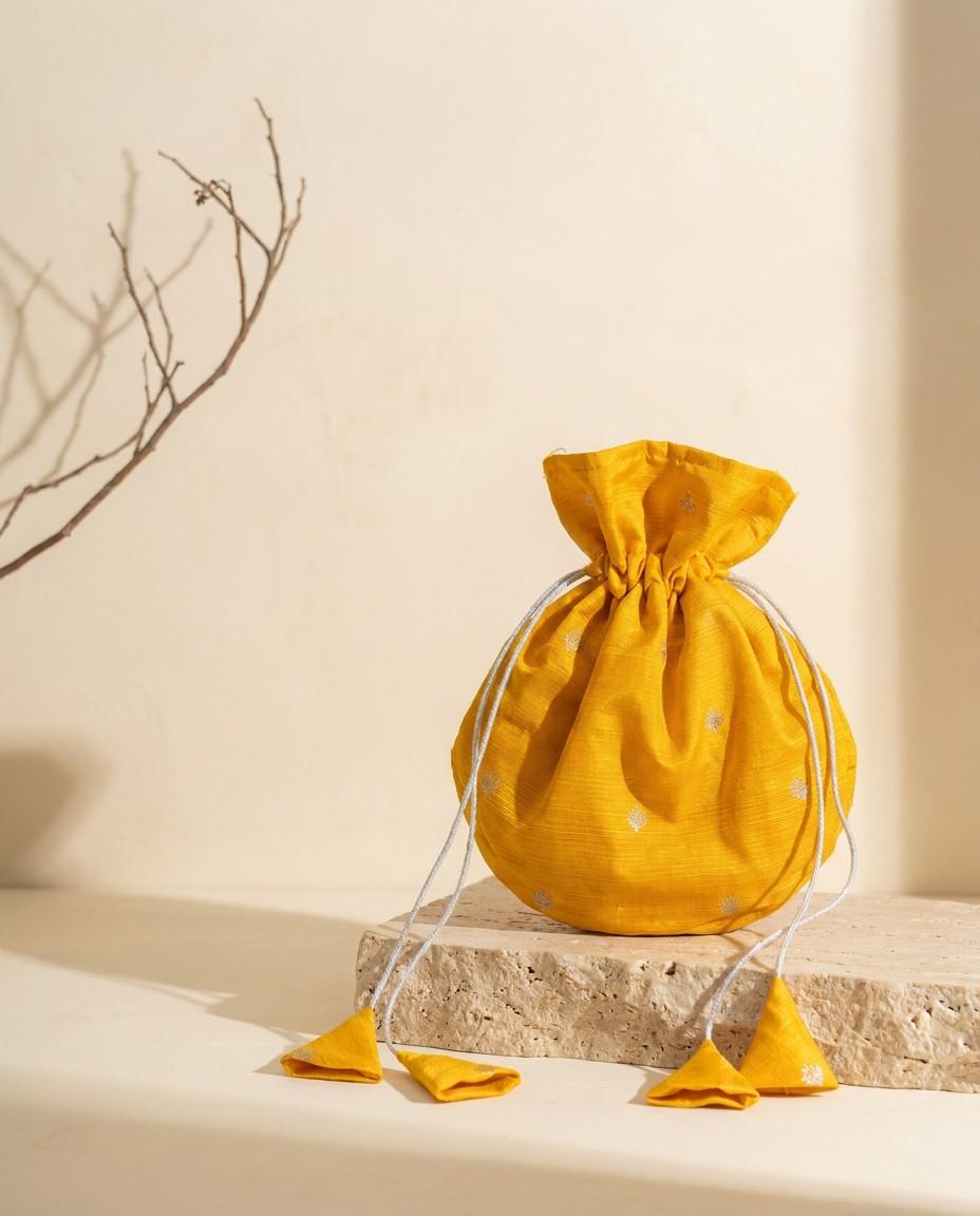 yellow silk potli bag