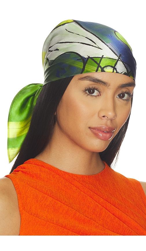 yellow the label x revolve axis silk scarf in green, blue, white.